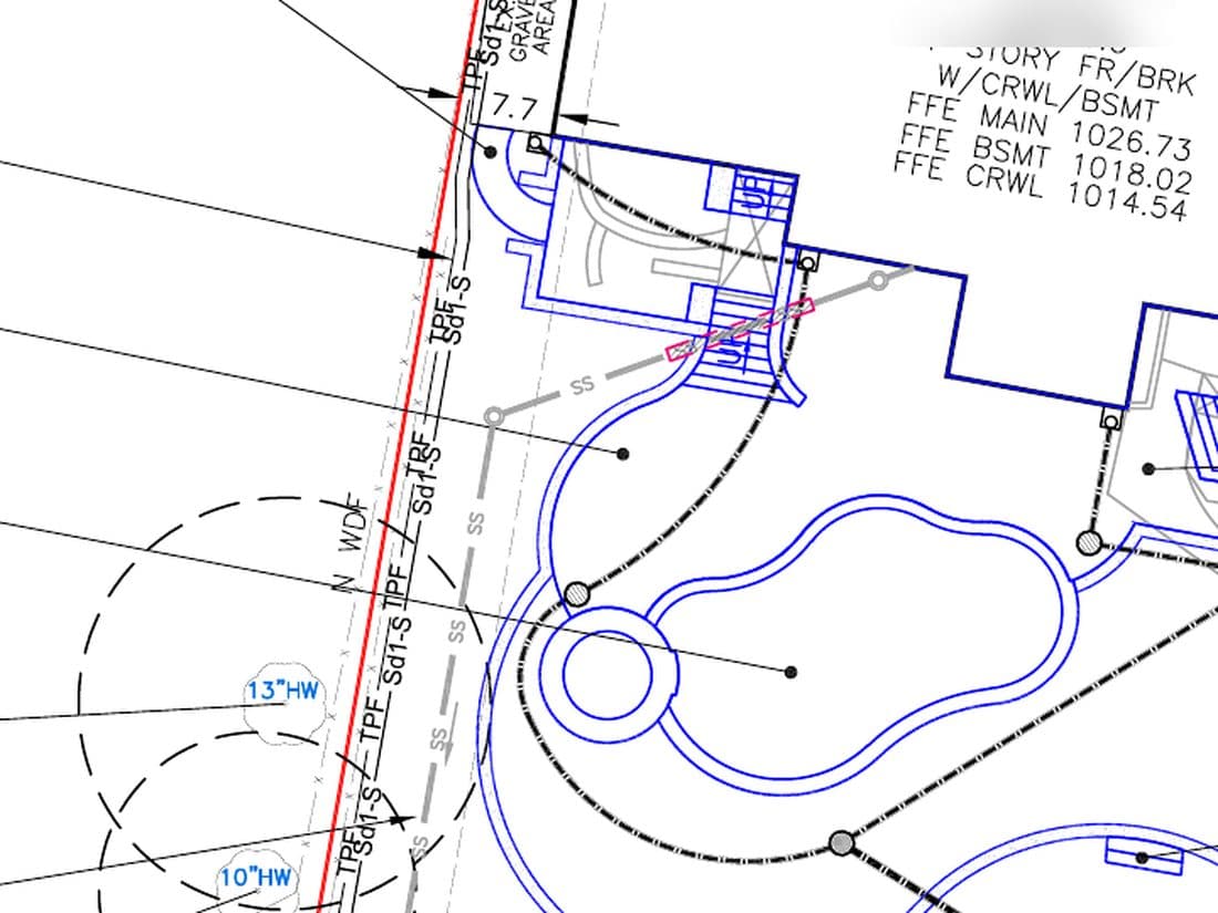 The permit set for the same pool — proposed pool and spa, paver deck, retaining walls, tree protection and limits of disturbance